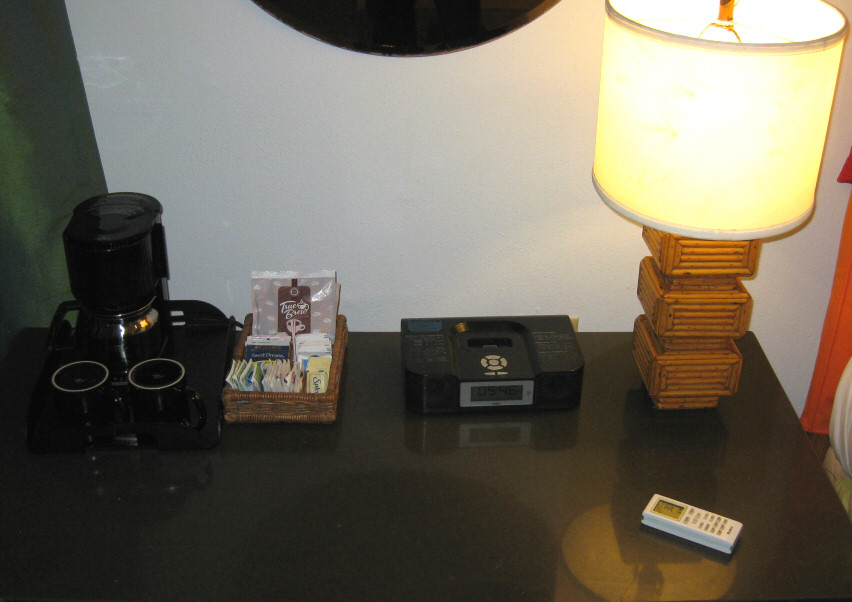 Coffee maker and iPod compatible radio.